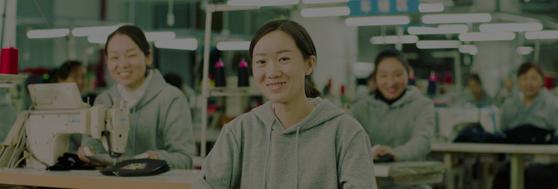 employees in hats and clothing manufacuturer