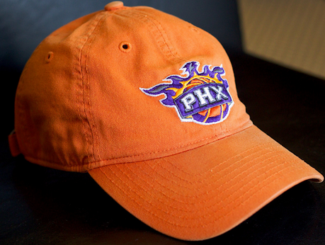 orange baseball cap