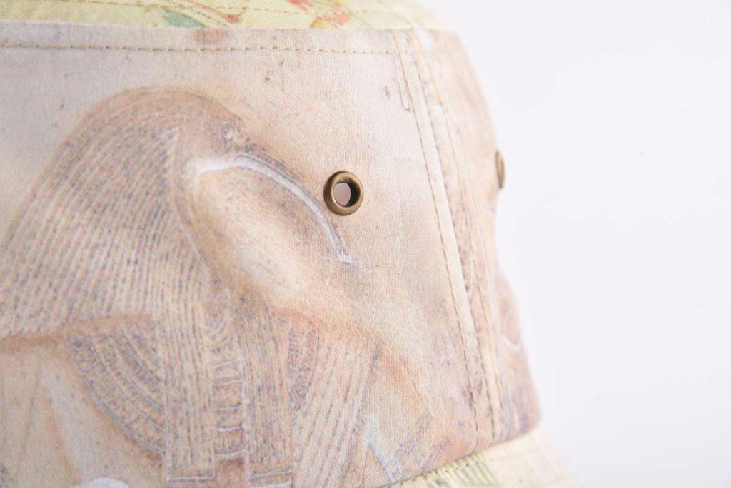  metal eyelets on the crown
