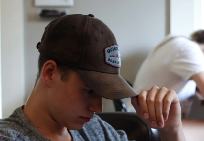 brown baseball cap